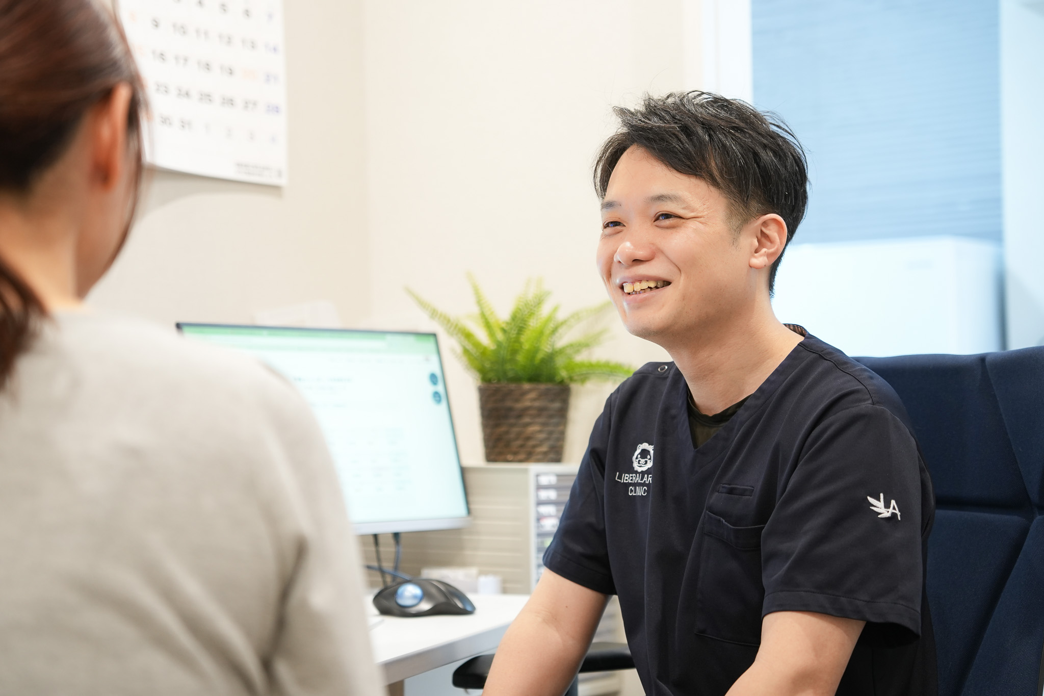 A doctor talking with a patient